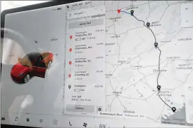  ?? MARSHALL GORBY PHOTOS / STAFF ?? The Tesla tells the driver where Supercharg­ers are located when traveling on a trip.