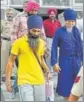  ?? HT PHOTO ?? KZF members Gurdev Singh (left) and Balbir Singh after being presented in an Amritsar court on Wednesday.