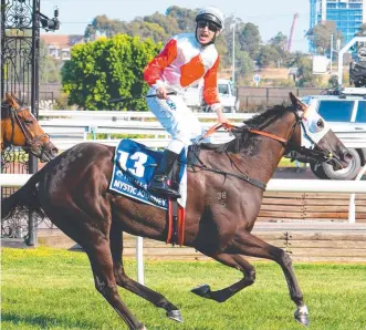  ?? Picture: GETTY IMAGES ?? CONFIDENT: Anthony Darmanin celebrates on Mystic Journey after taking out the All Star Mile at Flemington in March.