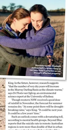  ??  ?? Warialda farmer Elizabeth Hollow (left) is given a hug by her twin sister Catherine on her drought-affected property.