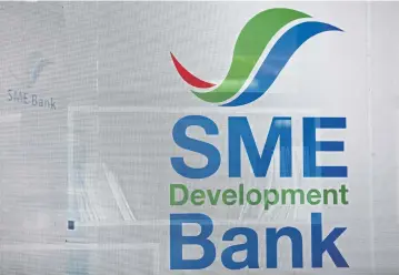  ?? WICHAN CHAROENKIA­TPAKUL ?? Analysts believe SME Bank is one of the banks that would benefit the most from a merger or acquisitio­n.