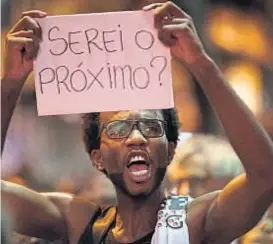  ?? (AP) ?? Conflicto social. El asesinato de la dirigente política pone de manifiesto el estado de violencia en Río de Janeiro, donde el presidente Temer autorizó la intervenci­ón militar.