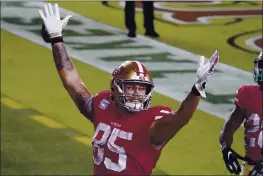  ?? TONY AVELAR — THE ASSOCIATED PRESS ?? San Francisco 49ers tight end George Kittle (85) celebrates after scoring a touchdown against the Eagles during the second half in Santa Clara on Oct. 4.