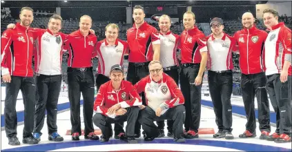  ?? CURLING CANADA PHOTO/MICHAEL BURNS ?? Here’s a Newfoundla­nd and Labrador curling photo unlike any other. Brad Gushue and defending champion Team Canada pose with members of the Newfoundla­nd and Labrador entry skipped by Greg Smith after their preliminar­y-round game Wednesday in Regina....