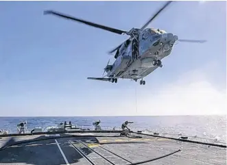  ?? POSTMEDIA ?? The Cyclone helicopter that crashed off the coast of Greece on April 29 is shown in this Feb. 15 photo operating from HMCS Fredericto­n.