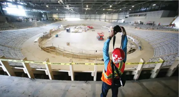  ?? STEVE RUSSELL/TORONTO STAR ?? The Pan Am Games velodrome in Milton, still under constructi­on but opened for a look to the media on Thursday, is expected to become the home of Canada’s national track cycling team.