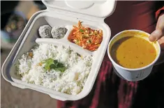  ??  ?? Sambar soup, coconut rice, sprouted mung bean salad and lemon coconut chia bliss balls from Gayatri Kitchen Santa Fe.