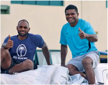  ?? ?? From left: Fiji Airways Fijian 7s forward Semi Kunatani and captain Tevita Daugunu during their clean-up campaign at the Sigatoka Hospital on May 12, 2022. Photo: FRU Media