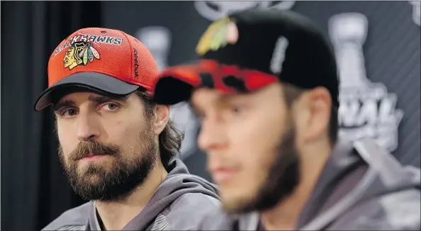  ?? — AP FILES ?? Chicago Blackhawks forward Patrick Sharp, left, and captain Jonathan Toews, have had their share of success with playoff beards in Chicago. You can’t expect them nor their teammates to break a hockey tradition started by the New York Islanders in the...