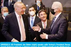  ?? — AFP ?? BRUSSELS: US President Joe Biden (right) speaks with Turkey’s President Recep Tayyip Erdogan prior to a plenary session of a NATO summit at the NATO headquarte­rs yesterday.