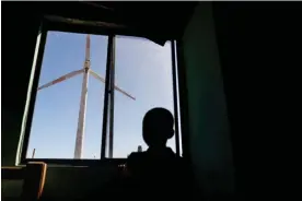  ?? ?? Wind turbines are part of life for many communitie­s in La Guajira, one of Colombia’s poorest regions and home to its largest Indigenous population