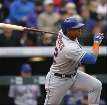  ?? DAVID ZALUBOWSKI — AP FILE ?? Mets’ Yoenis Cespedes bats against the Rockies. The slugger opted out of the remaining two years of his 3-yeard deal with New York to become a free agent again.