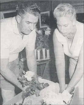  ??  ?? Pat and Paddy Stephens packing roses for export to America in 1967.