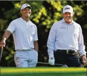  ?? CURTIS COMPTON / CCOMPTON@AJC.COM 2018 ?? Phil Mickelson beat Tiger Woods for $9 million in a winner-take-all match over Thanksgivi­ng weekend in 2018, and it was a dud. The final charity tally Sunday was $20 million.