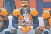 ?? JACK DEMPSEY/ASSOCIATED PRESS FILE PHOTO ?? The Broncos’ Von Miller takes a breath of oxygen against the Bears on Sept. 15. The Pro Bowl linebacker hasn’t forced a fumble or a sack yet this year.