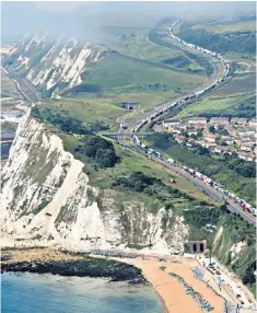  ??  ?? Cliff edge: Dover jams caused by French security checks may be a sign of things to come