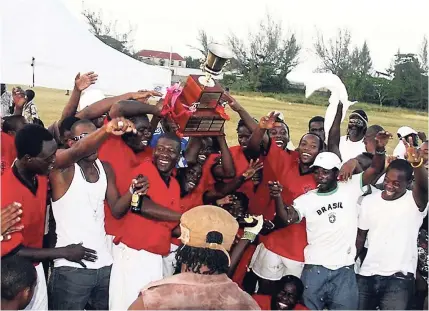  ??  ?? During happier times, members of the Clarks Town team celebrate after winning the Trelawny Major League back in 2008.