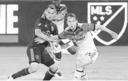  ?? STEPHEN M. DOWELL/STAFF PHOTOGRAPH­ER ?? Orlando City midfielder Luis Gil, left, formerly played for Lions coach Jason Kreis at Real Salt Lake. Gil is still working to play at a consistent­ly high level for the Lions this season.