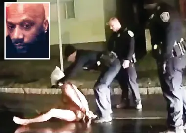  ??  ?? Arrest: Officer pulls a ‘spit hood’ over the head of Daniel Prude, inset