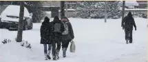  ??  ?? Walking conditions were treacherou­s in the Alderwood area of Tallaght yesterday.