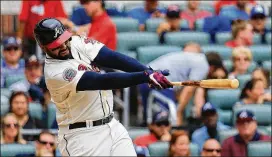  ?? DANIEL SHIREY / GETTY IMAGES ?? Matt Kemp launches a three-run home run during the third inning Sunday against the Diamondbac­ks.