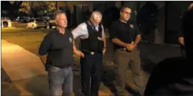  ?? AP PHOTO/JEFFREY COLLINS ?? Florence County Sheriff Kenney Boone, from left, Florence Police Chief Allen Heidler and Florence County Chief Deputy Glenn Kirby speak to the media following a shooting where several law enforcemen­t officers were shot, one fatally, Wednesday, Oct. 3, 2018, in Florence, S.C.