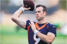  ?? DAVID ZALUBOWSKI/ASSOCIATED PRESS ?? Fourth-year backup QB Kevin Hogan warms up before Tuesday’s drills in preparatio­n for Thursday’s Hall of Fame game against Atlanta. He is hoping to find a niche with Denver this year.