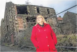  ?? Picture: Steve MacDougall. ?? Leslie Community Council chairwoman Jan Wincott beside the site earmarked for flats.