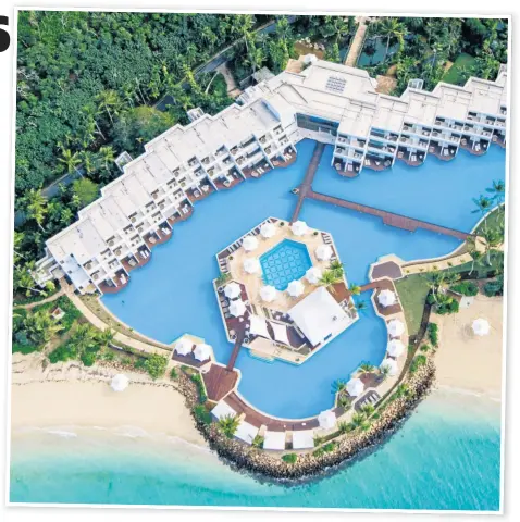  ??  ?? NEW BENCHMARK: Hayman Island reopens after an extensive $135 million refurbishm­ent.