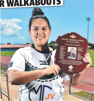  ?? Picture: ALIX SWEENEY ?? READY TO GO: Breanne Saltner with the Kaleob Leo Shield ahead of the Bindal Sharks All Blacks Carnival at Townsville Sports Reserve.