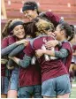  ?? Craig Moseley / Chronicle ?? The Cinco Ranch Cougars celebrate Ali Russell’s goal in the second overtime period of Saturday’s match.