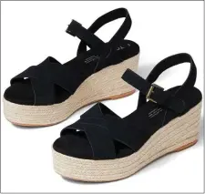  ?? PHOTO COURTESY TOMS.COM ?? RISE ABOVE: Tom’s Willow platform sandal features classic espadrille styling.