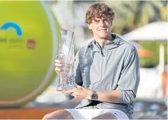  ?? AFP ?? Jannik Sinner poses with the Miami Open trophy after his victory in the final on Sunday.