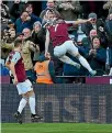  ??  ?? Marko Arnautovic celebrates his winner for West Ham as they upset the defending champions.