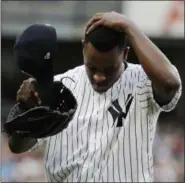  ??  ?? Yankees starting pitcher Luis Severino leaves during the fifth inning of a 10-5 loss to Red Sox on Saturday.