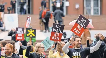  ?? JASON REDMOND, AFP/ GETTY IMAGES ?? On the verge of a Supreme Court showdown, President Trump’s travel ban is being revised.