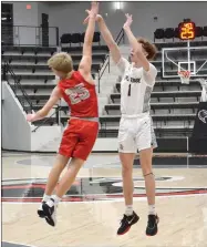  ?? TIMES photograph­s by Annette Beard ?? Junior Ben Wheeler scored 13 points Saturday in the championsh­ip game between the Pea Ridge Blackhawks and the County Line Indians in the Battle on the Ridge.