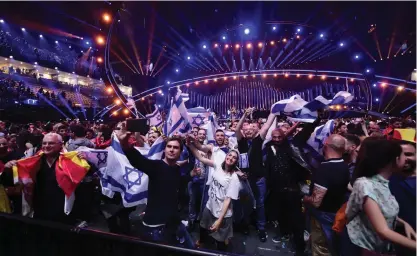  ?? Foto: tt/Stina StJErnKviS­t ?? Israeliska fans firar Eurovision­segern i Lissabon.