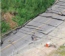  ?? — AFP photo ?? An aerial view of the damage caused on a road in the northern Peruvian department of Amazonas.