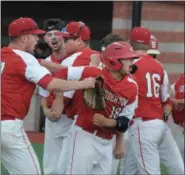  ?? GENE WALSH — MEDIANEWS GROUP ?? Souderton’s Jordan Morales celebrates his run with teammates against Garnet Valley.