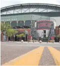  ?? MICHAEL CHOW/THE REPUBLIC ?? Chase Field in Phoenix is quiet Thursday. Opening Day for the D-Backs has been postponed due to the pandemic.