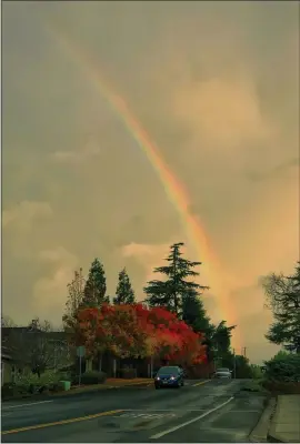  ?? JOSE CARLOS FAJARDO — STAFF PHOTOGRAPH­ER ?? An early morning rainbow lights up the sky in Martinez between downpours on Thursday.