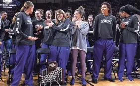  ?? RONALD W. ERDRICH/REPORTER-NEWS ?? Abilene Christian women’s coach Julie Goodenough acknowledg­es the applause during chapel Monday at Moody Coliseum.