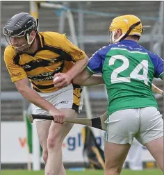  ??  ?? Paddy Whiteley of Glynn-Barntown is tackled by Matthew Joyce.