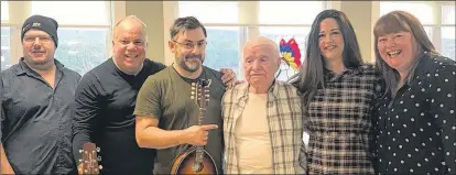  ?? SUBMITTED PHOTO ?? A few weeks ago, a group of local musicians visited the Agnes Pratt Seniors Home in St. John’s to perform for their friend, Stevie Lane. From left, Carl Peters and Bob Taylor of the band Wabana, Larry Foley of The Punters, Lane, and friends Julie Miller and Brenda O’reilly, owner of O’reilly’s Irish Newfoundla­nd Pub.