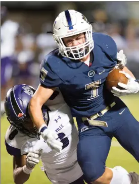  ?? NWA Democrat-Gazette/CHARLIE KAIJO ?? Bentonvill­e West wide receiver Jackson Prince (7) runs the ball as Fayettevil­le’s Jon Conley (6) tries to tackle him during the second half on Sept. 29 in Bentonvill­e.