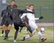  ?? KIRK NEIDERMYER - FOR DIGITAL FIRST MEDIA ?? Daniel Boone’s Matt Glady controls the ball from Manheim Central’s Jason Andrews at Cedar Crest High School in South Lebanon on Thursday, October 27.