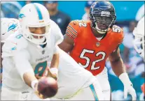  ?? JOSE M. OSORIO/CHICAGO TRIBUNE ?? Chicago Bears outside linebacker Khalil Mack, center, is listed as questionab­le for Sunday’s game against the Patriots. He has a sprained right ankle.