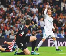  ?? Reuters ?? Real Madrid’s Cristiano Ronaldo reacts after scoring a beauty of a goal late into the match against Athletic Bilbao at the Santiago Bernabeu in Madrid on Wednesday.