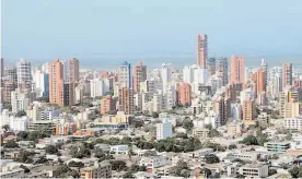  ??  ?? Según el ministro la vocación económica de Barranquil­la está orientada a la provisión de servicios, como sociales, personales y financiero­s.